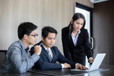 asian-businessmen-business-partners-discussing-documents-ideas-meeting_33718-911